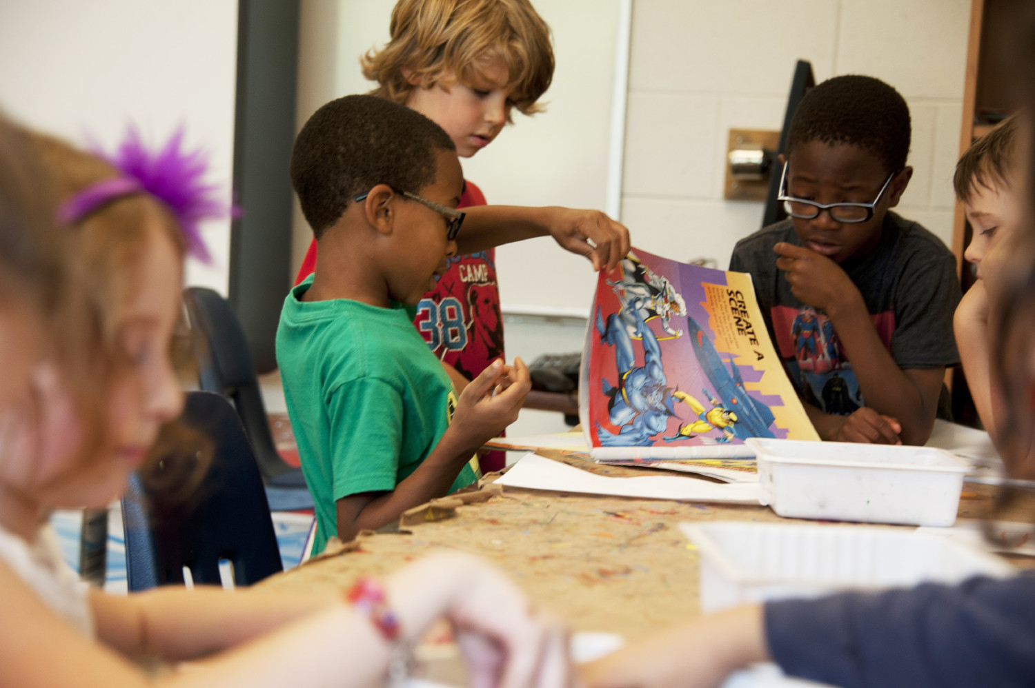 children working on a project together